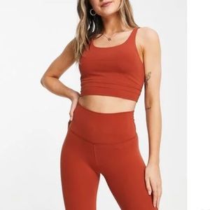 NIKE YOGA LUXE CROP TOP and CYCLING SHORTS IN RUST-ORANGE